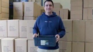 Male holding a shipment