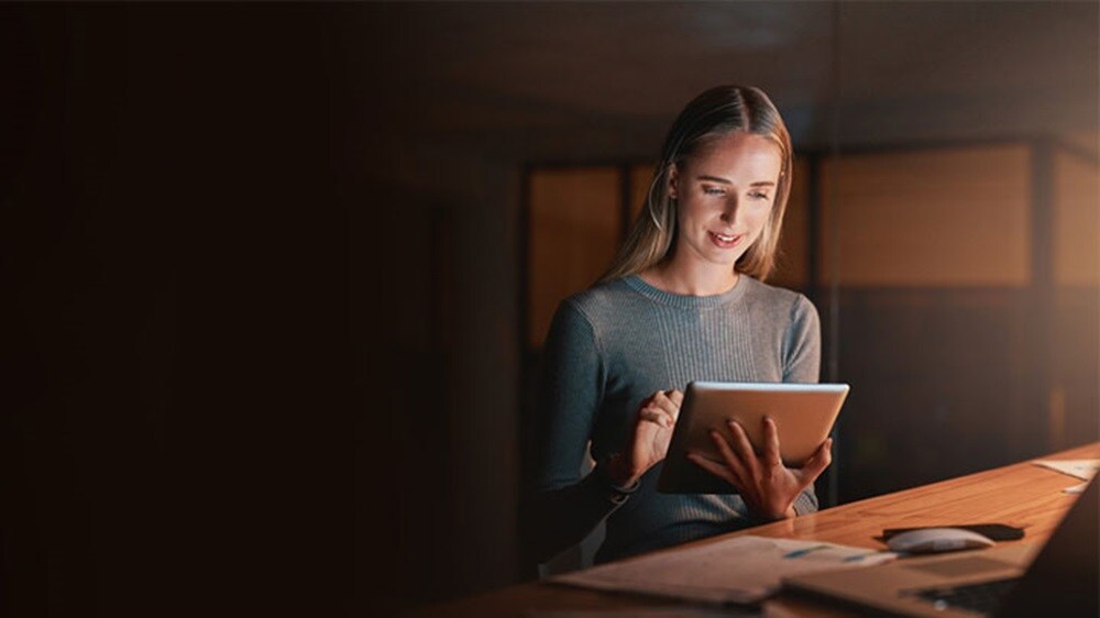 A businesswoman using a digital tablet