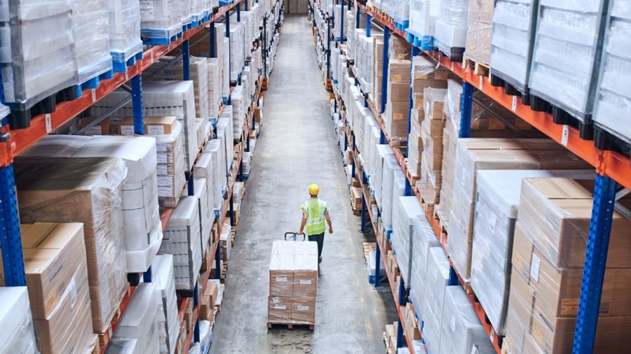 Stock of operator working inside warehouse